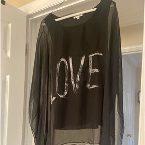 Black handkerchief blouse reads “LOVE” size small